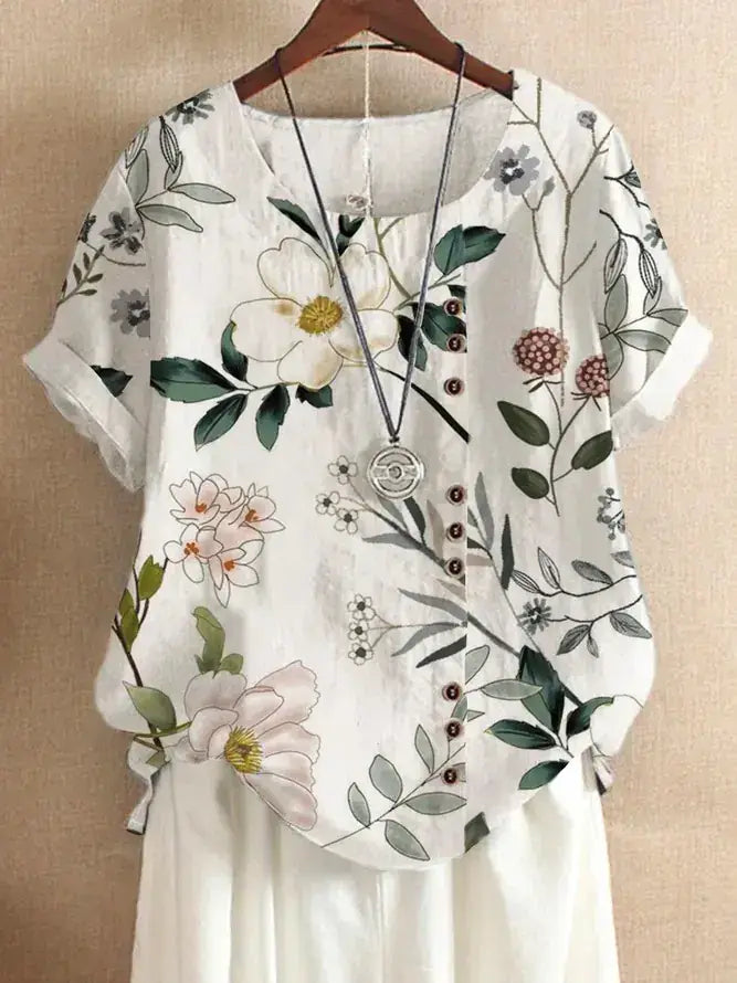 Summer Vintage Cotton Linen Loose T-Shirt with floral prints and buttons on a light background.