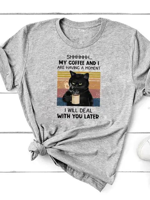 Short Sleeve T-Shirt for Women featuring a black cat with a coffee mug and humorous text.