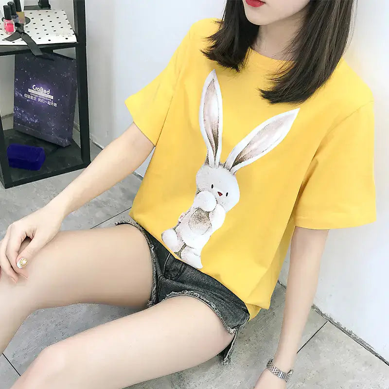 Short Sleeve T-Shirt for Women featuring a playful bunny print on vibrant yellow fabric.