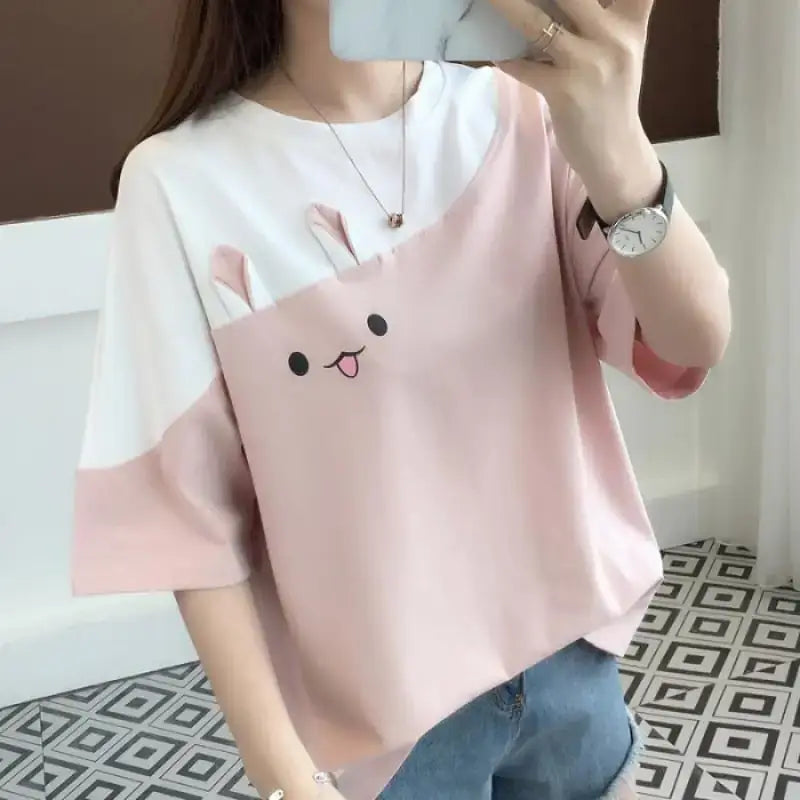 Women's Short Sleeve T-Shirt featuring a cute rabbit embroidery design in pink and white.