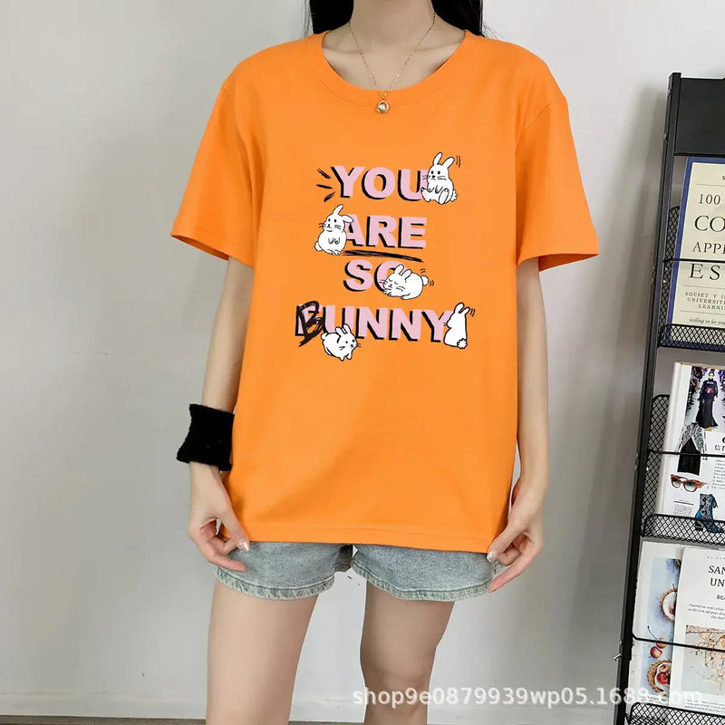 Short Sleeve T-shirt For Women's in orange featuring playful bunny graphic design.