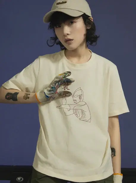 Short Sleeve T-Shirt for women in beige color featuring a unique graphic design, perfect for a chic summer look.