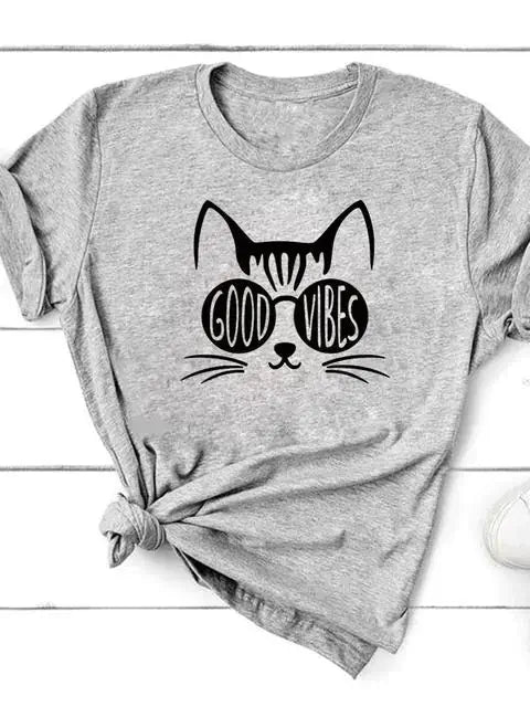 Short Sleeve T-Shirt for Women featuring a playful cat design with 'Good Vibes' slogan in stylish typography.