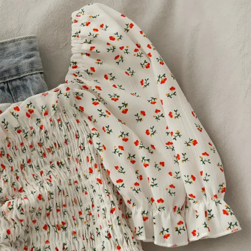 Floral Ruffled Tops for Women - Elegant Chic Crop Top featuring floral print and ruffled sleeves.