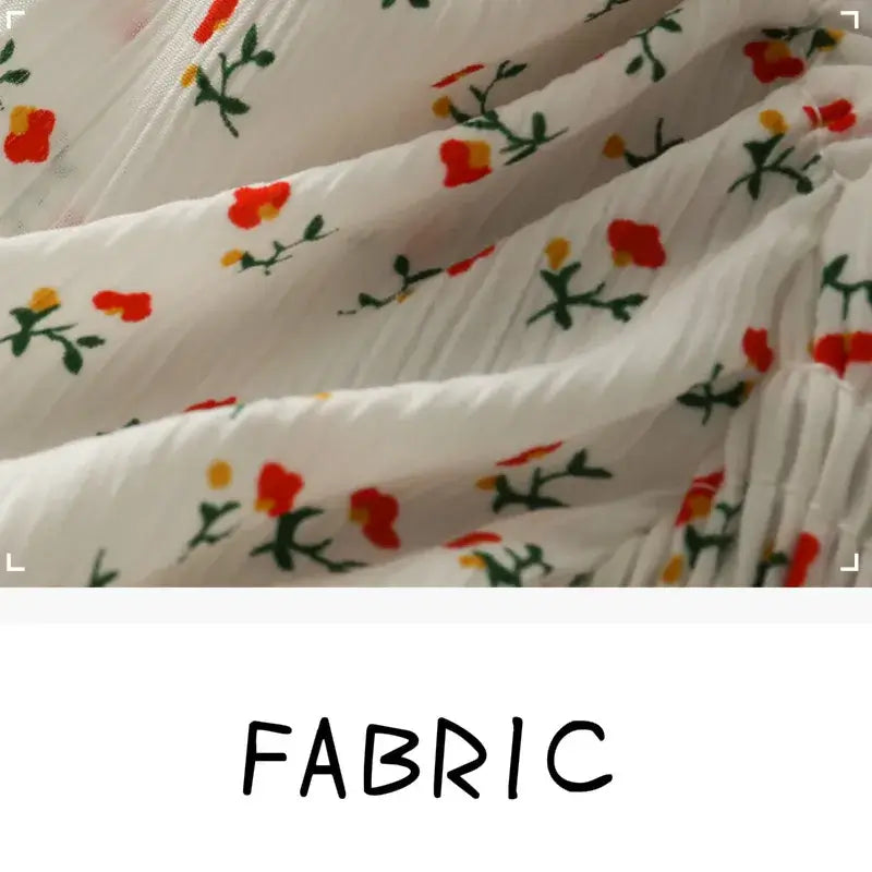 Floral Ruffled Tops for Women - Elegant Chic Crop Top fabric detail with floral embroidery and pleated design.