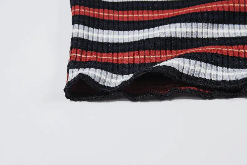 Close-up of the hem of a Short Sleeve T-Shirt for Women featuring striped design in red, white, and black.