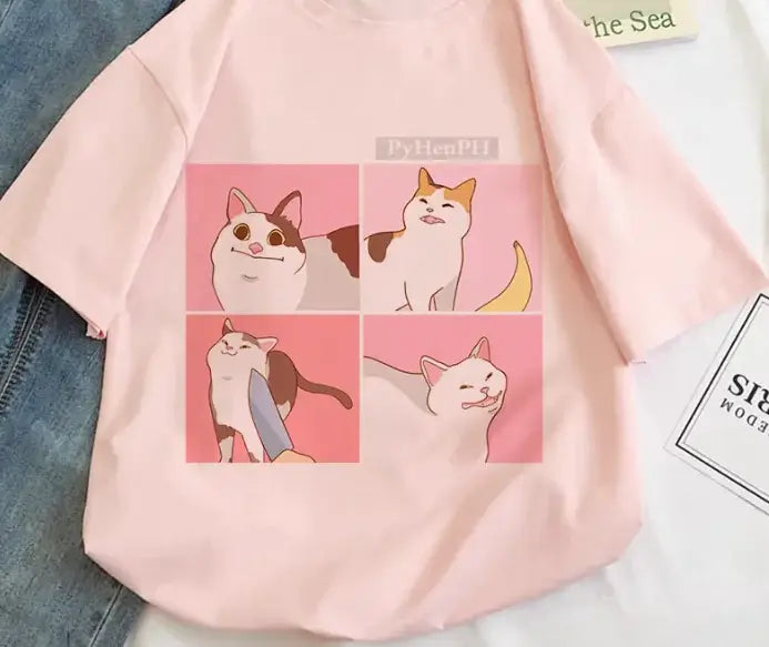 Women's Short Sleeve T-Shirt featuring a quirky cartoon cat print in pink, perfect for casual outings.