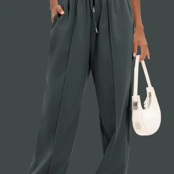 Leg Sweatpants Women Baggy Sweat Pant featuring high-waisted design and side pockets in stylish dark color.