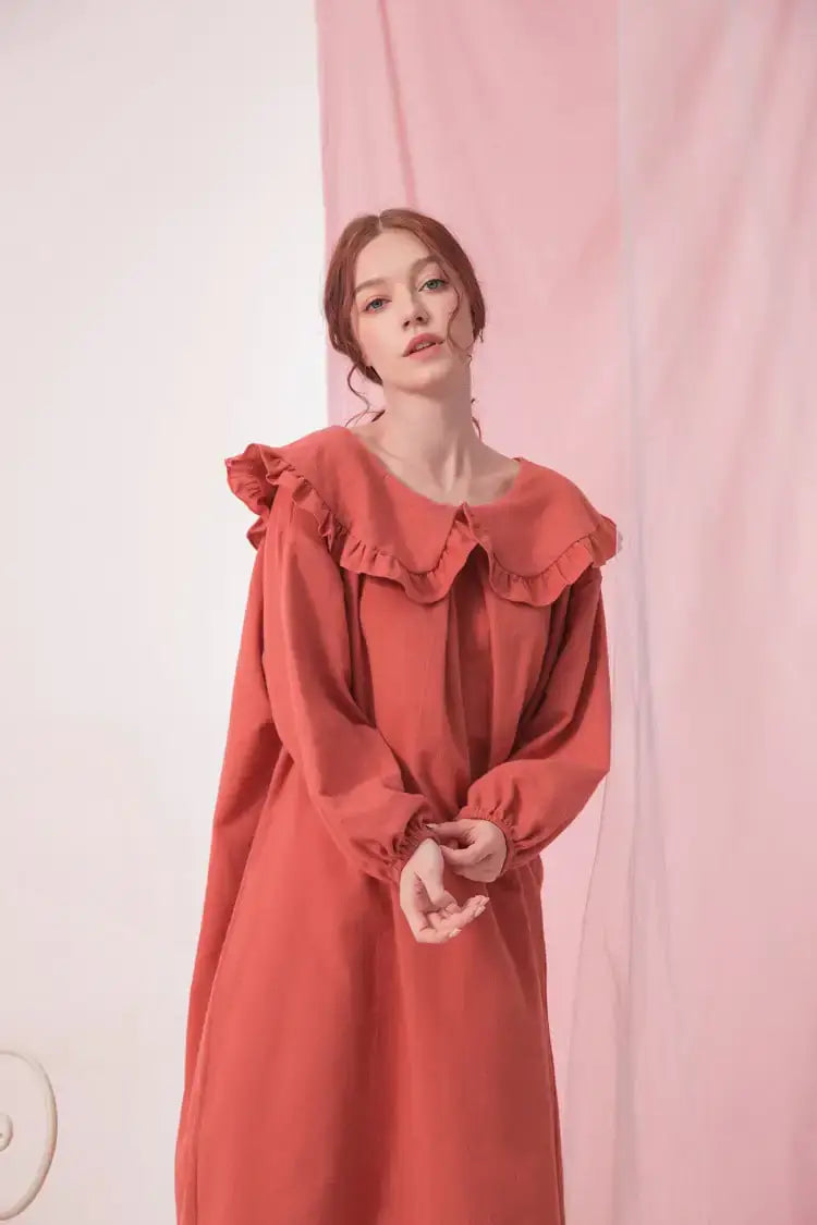 Pajamas and Home Wear for Pregnant Women in a stylish long-sleeve dress with ruffle collar.