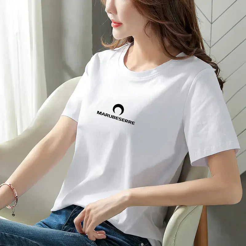Short Sleeve T-Shirt For Women's worn by a model, showcasing a white tee with a round neck and stylish logo.