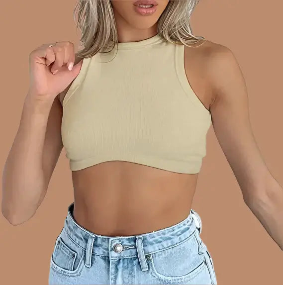 Crop Tops for Women Sexy Sleeveless Crewneck in cream color, model showcasing stylish outfit with high-waisted jeans.