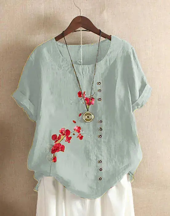 Summer Vintage Cotton Linen Loose T-Shirt featuring floral prints and short sleeves displayed on a hanger.
