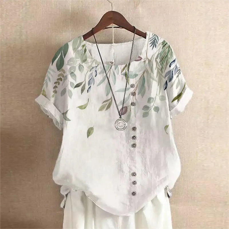 Summer Vintage Cotton Linen Loose T-Shirt with floral prints and buttons on a hanger.