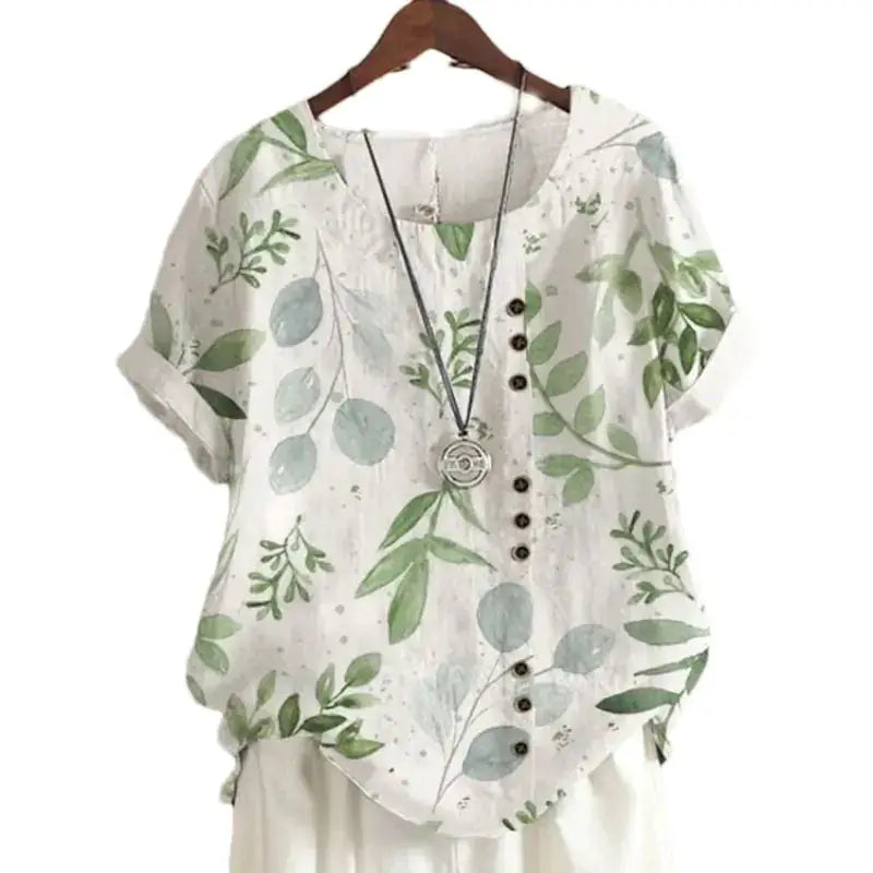 Summer Vintage Cotton Linen Loose T-Shirt featuring a floral print design, short sleeves and button details.