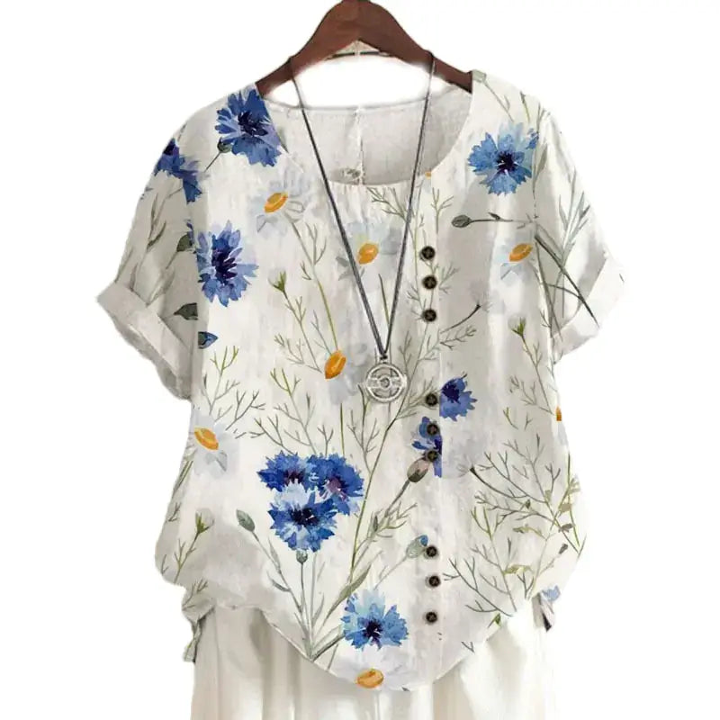 Summer Vintage Cotton Linen Loose T-Shirt with floral print and short sleeves, perfect for a casual summer outing.
