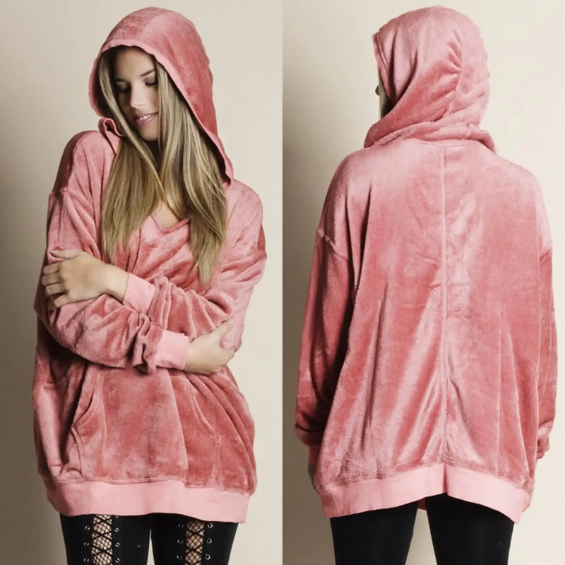 Trendy Fleece Comfort Top in soft pink color with hood, showcasing drop shoulder design and loose fit for style and comfort.