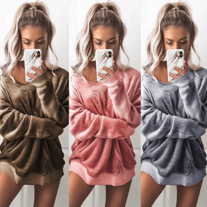 Trendy Fleece Comfort Top in three colors: brown, pink, and blue, showcasing cozy and stylish design.