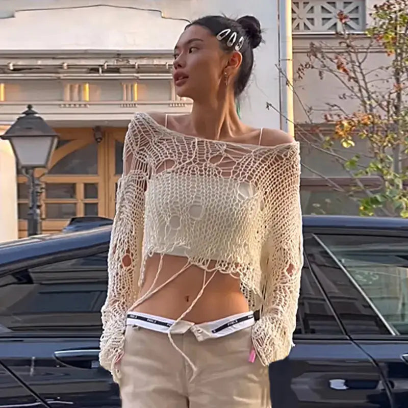 Trendy Woolen Streetwear Top featuring a unique distressed look and slouchy shoulders, perfect for edgy outfits.