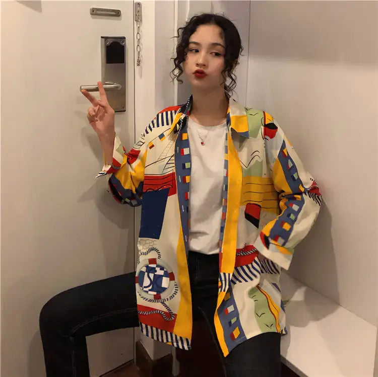 Vintage French Style Long Sleeve Shirt worn by a model, featuring bold abstract print and relaxed fit.