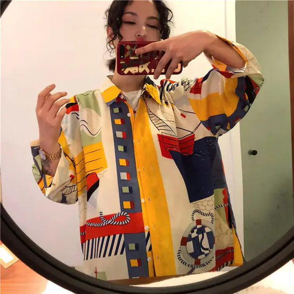Vintage French Style Long Sleeve Shirt featuring an abstract colorful print in a loose fit, perfect for retro fashion lovers.