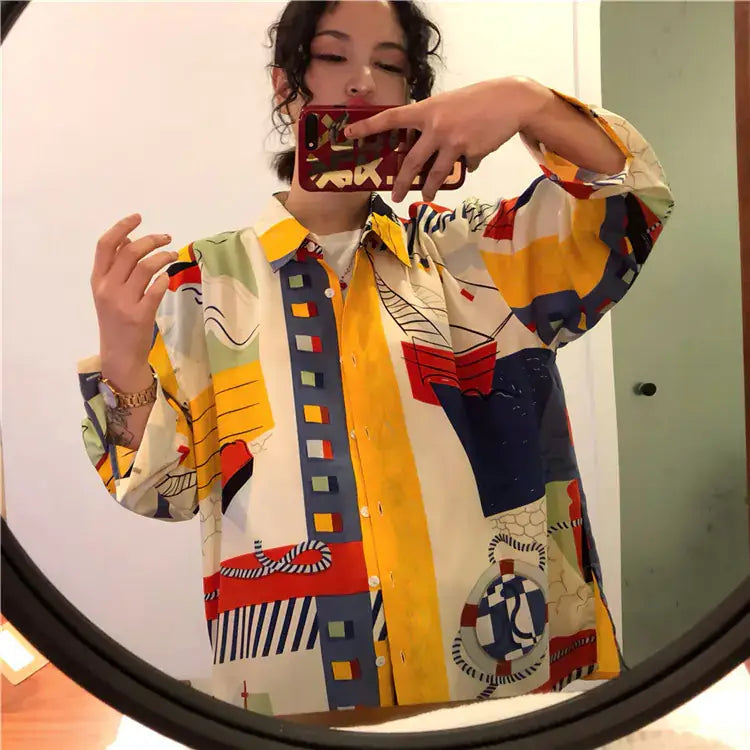 Vintage French Style Long Sleeve Shirt featuring an abstract colorful print in a loose fit, perfect for retro fashion lovers.
