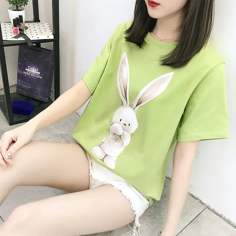 Short Sleeve T-Shirt for Women featuring a playful cartoon bunny design in vibrant green color.