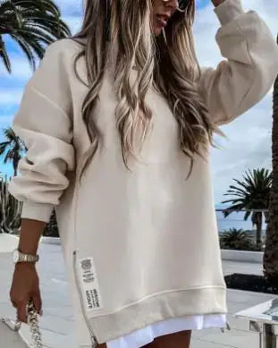 Winter Sweatshirt Dress for Women worn casually by a model outdoors with palm trees in the background.
