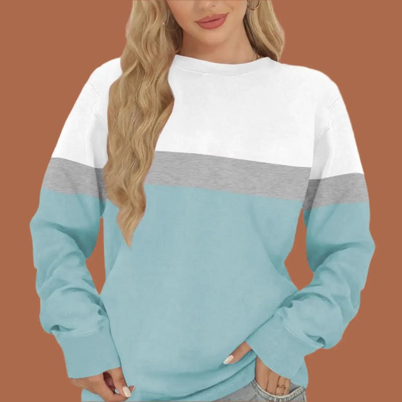 Women Sweatshirt Casual Crewneck in light blue with white and gray color block design.