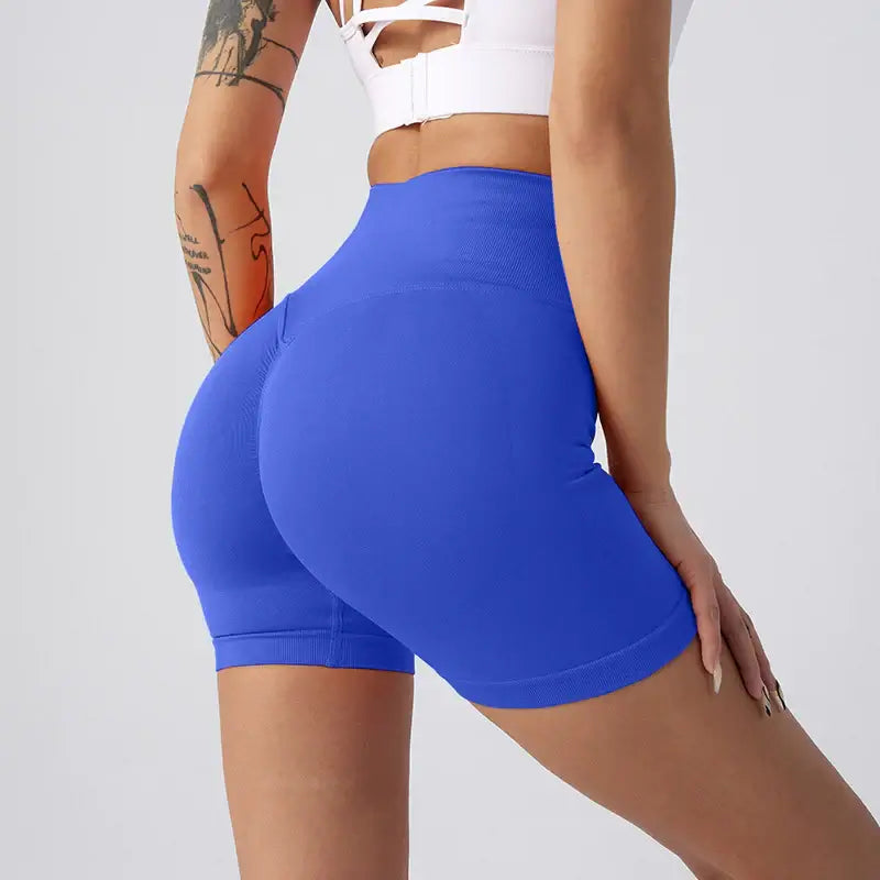 Women Yoga Shorts in blue, showcasing breathable nylon fabric and a stylish design for active women.