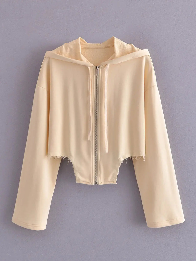 Women's Asymmetrical Hem Sweatshirt in soft yellow with a trendy crop style and hoodie detail.