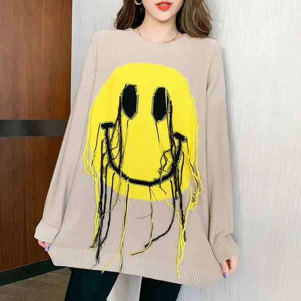 Women's Blissful Smile Pattern Sweater featuring a vibrant smiley face design on a cozy fabric.
