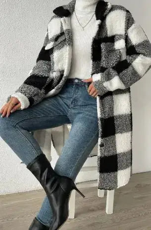Women Long Plaid Fleece Sweatshirt featuring black and white plaid pattern, styled with jeans and boots.