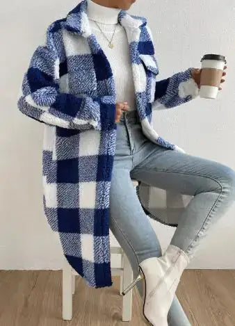 Women Long Plaid Fleece Sweatshirt worn with light jeans and holding a coffee cup, showcasing its cozy design.