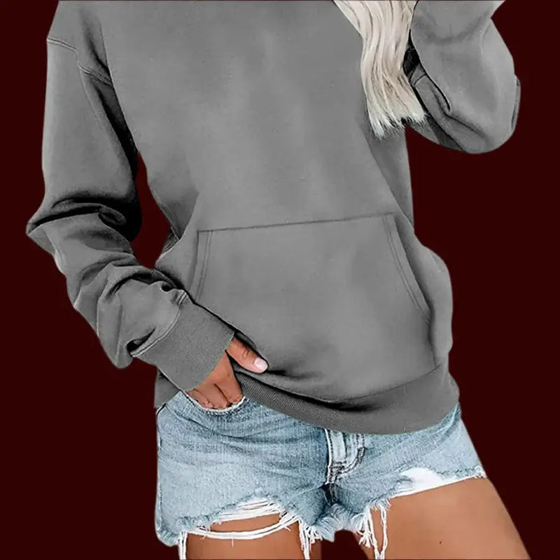 Sweatshirt for Women Long Sleeve Crewneck in gray, styled with denim shorts for a casual look.