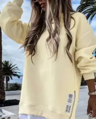 Winter Sweatshirt Dress for Women styled in a cozy yellow fabric, perfect for casual outings or lounging.